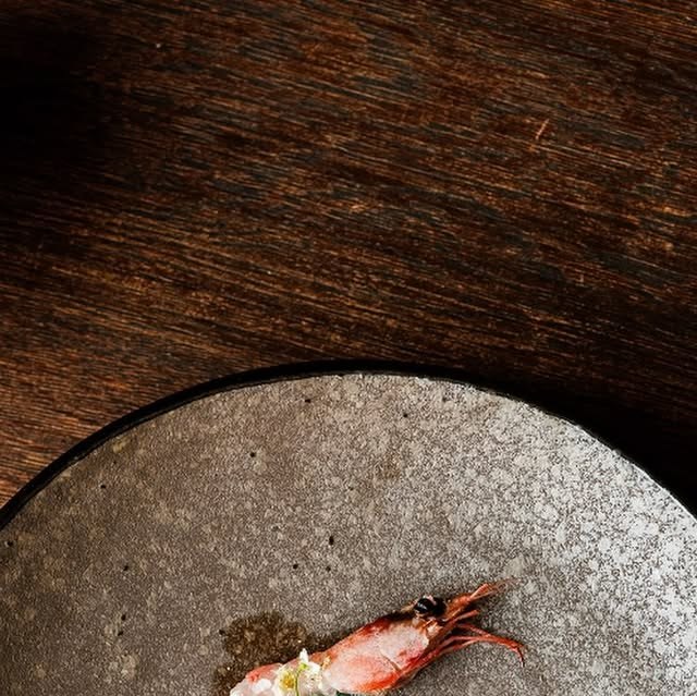 Shrimp seasoned in apricot ponzu with whey and wasabi leaf dressing